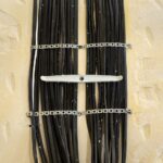 Jak wybrać odpowiednie opaski zaciskowe do instalacji elektrycznych i hydraulicznych